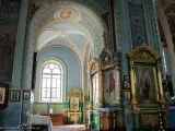 Вхід до Всіхсвятського приділу Свято-Озерянського храму після реставрації. Липень 2022 року.